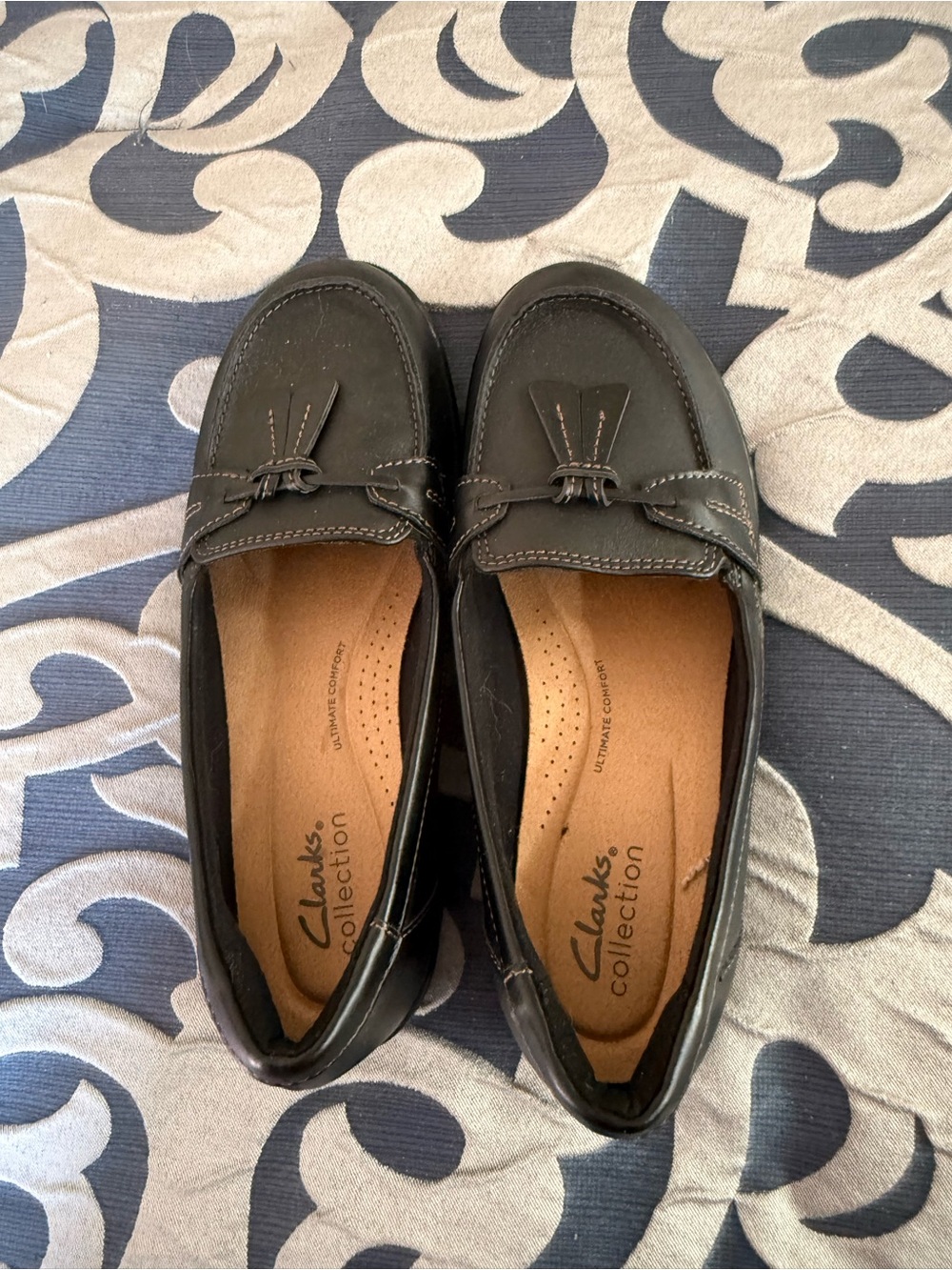 Clarks Black Leather Women's Loafers with Moc Toe Stitching